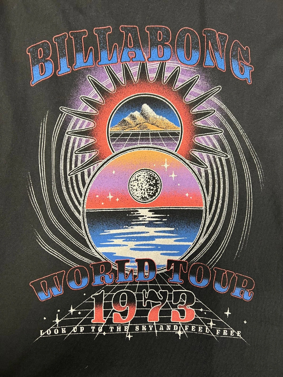 Billabong Women's Black T-Shirt World Tour 1973 Graphic Print Tee S/S (S01)